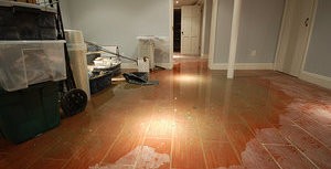 Water Damage Due To Flooded Bathroom