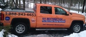 Water Damage Green truck On Driveway In Winter