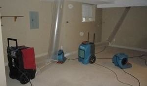 Dehumidifiers In Basement After Water Damage Restoration